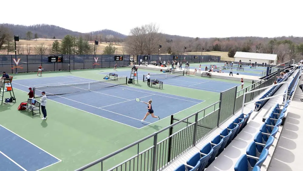 Athletes playing on multiple tennis courts